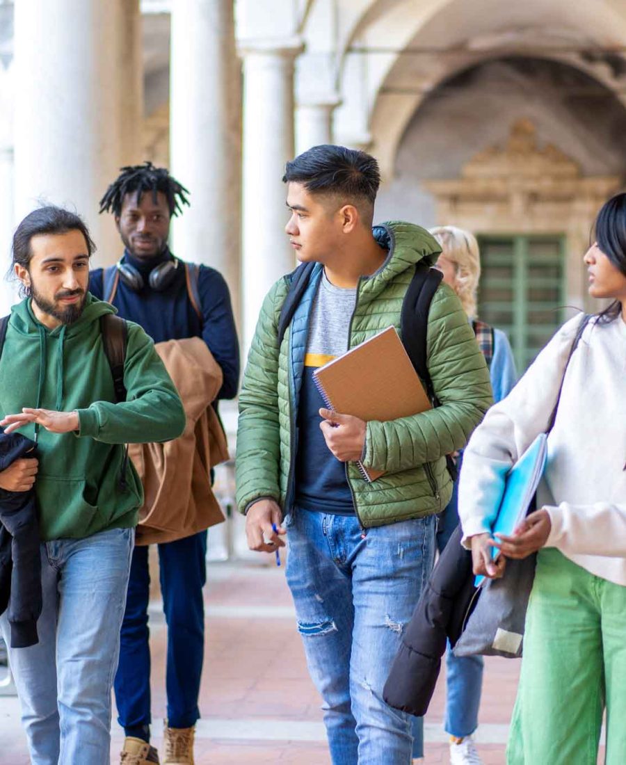 diverse-university-students-walking-on-campus-2025-03-06-16-01-32-utc.jpg